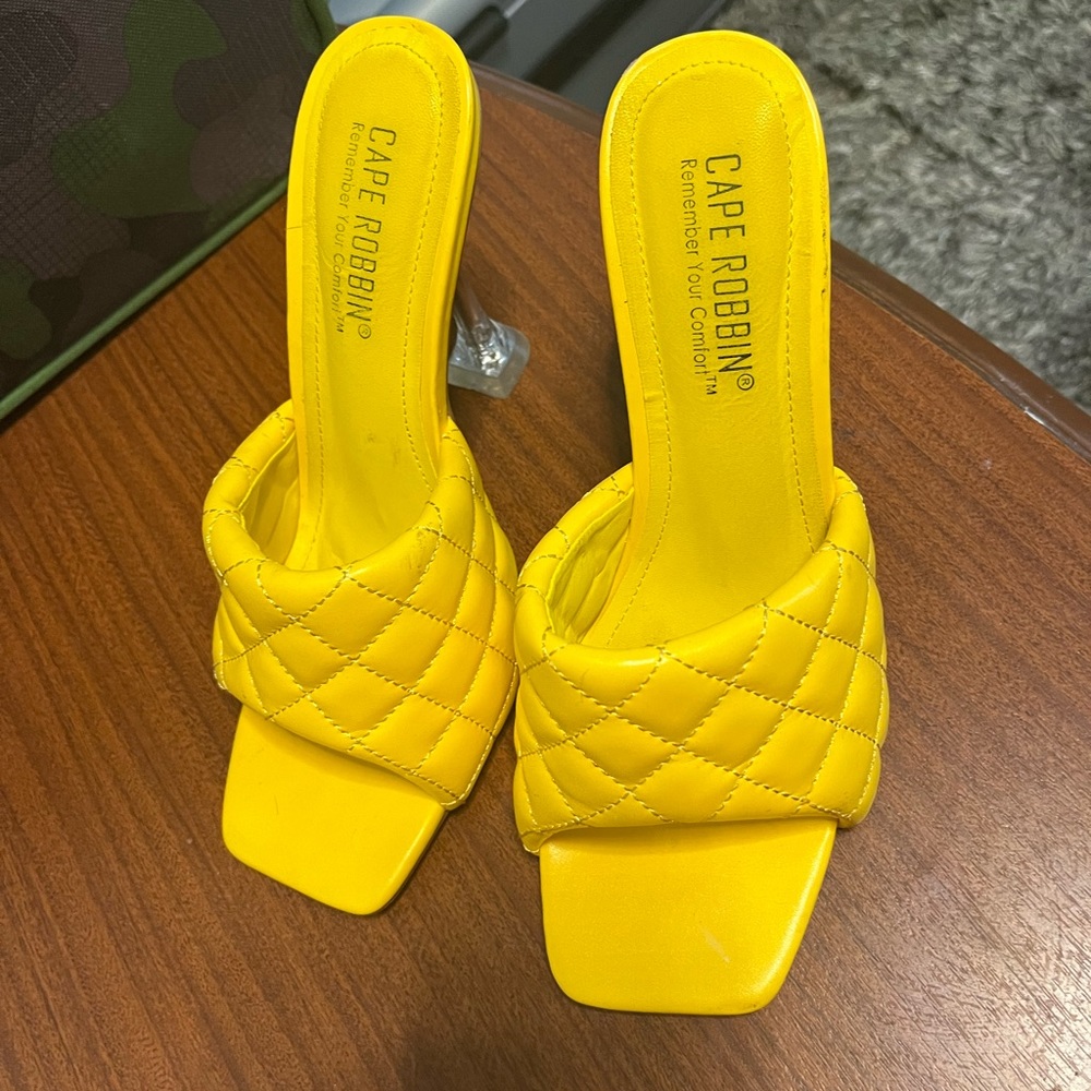 Yellow cape Robbin heels